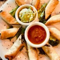 Taquitos · Vegan, gluten free. Five taquitos made from blended organic black beans and green chilies. S...