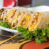 Nacho Fry Burrito · Our awesome Nacho Fries wrapped up in a warm flour tortilla: fries with organic black beans,...