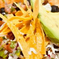 Taco Taco Taco Salad · Organic lettuce, spicy Impossible ground beef,  organic black beans, shredded vegan cheese, ...