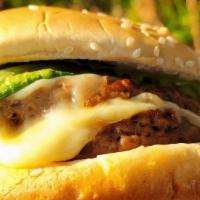 Double Delicious Burger · Two thin Impossible Burger patties, Saturn sauce, two slices of organic vegan cheese, organi...
