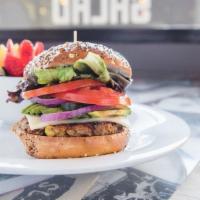 California Burger · Saturn patty with organic vegan Jack cheese, sliced avocado, vegan mayo, organic lettuce, or...