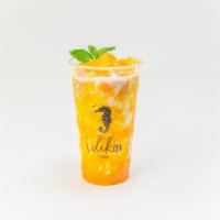 Tropical Smoothie · Signature tropical  smoothie made with mangoes and passion fruit.