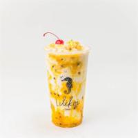 Tropical Horchata · Tropical puree (mango, pineapple, passion fruit) with horchata smoothie.