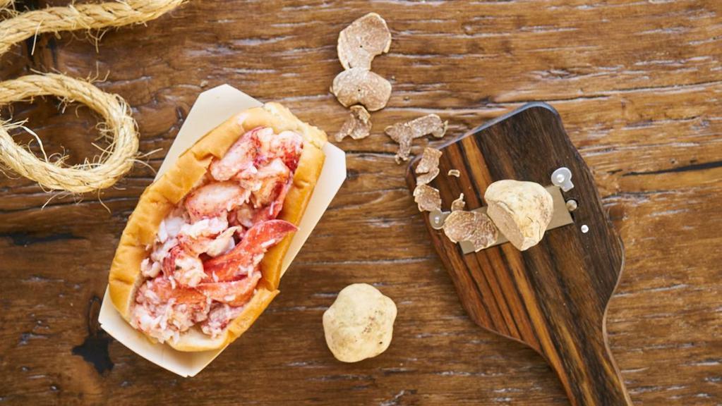 White Truffle Rolls · Our most decadent roll yet! 4oz or 6oz of chilled, wild-caught lobster crab or shrimp in a toasted, buttered bun with mayo and topped with melted Urbani white truffle butter. Served with kettle chips.