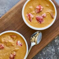 Lobster Bisque · Hearty chunks of wild-caught lobster claw meat in a smooth, cream-based soup made with lobst...