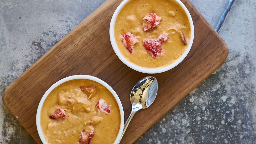 Lobster Bisque · Hearty chunks of wild-caught lobster claw meat in a smooth, cream-based soup made with lobster. Made in small batches by Hurricane's Soups in Greene, Maine. GF