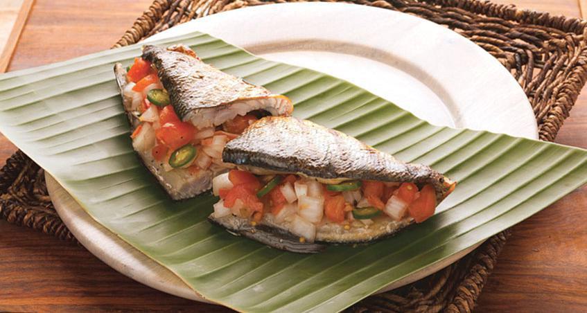 2 Pieces Grilled Half Bangus · 2 pieces of grilled half bangus or milkfish stuffed with our signature tomato and onion salsa.