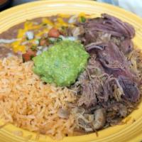 Carnitas · Rice, beans, guacamole, and pico de gallo.