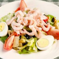 Shrimp Louie Salad or Crab Louie Salad · Bed of lettuce, bell peppers, olives, artichokes, tomatoes, and hard-boiled eggs. Served wit...