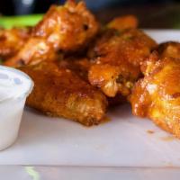 BBQ Wings · Eight sweet honey BBQ glazed chicken wings served w/ ranch dressing.