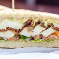 Chicken & Brie Club · Sliced grilled chicken breast, bacon, brie, butter leaf lettuce, tomato, red onions, avocado...