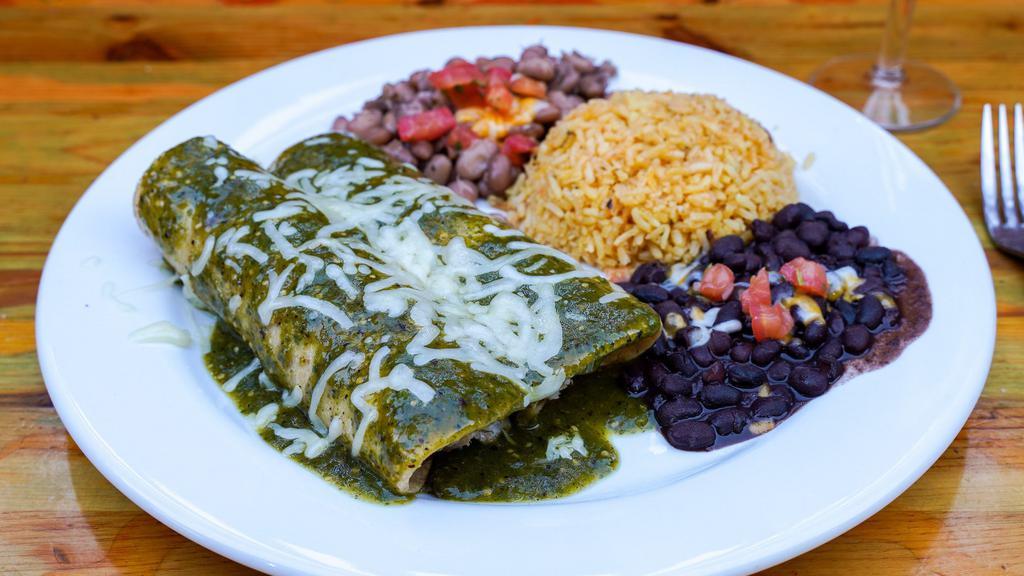 Enchiladas · Two cheese, choice of meat, wrapped corn tortillas, smothered in roasted tomatillo salsa. Served with rice and choice of black or pinto.