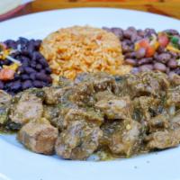 Pork Chile Verde · Oven roasted pork cooked with peppers, onions, tomatillos, garlic and Mexican spices. Served...
