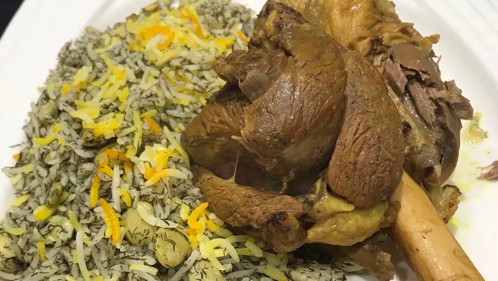 Lamb Shank or Salmon Over Green Rice · Whole lamb shank served with rice cooked with saffron, dill, and lima bean. Similar to baghali polo.