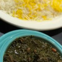 Ghormeh Sabzi (Vegan Available) · Beef stew cooked in herb based broth with dried lemon and red beans. Served with saffron bas...