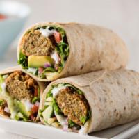 Vegan Falafel Wrap · Classic mediterranean famous wrap with chickpea fritters, lettuce, tomatoes, onions, cucumbe...