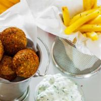 Spicy Vegan Falafels + Basket of Fries · Crispy vegan chickpeas fritters with fresh hand cut french fries for exquisite taste and top...