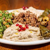 Mezza Plate · Hummus, Baba ghannouge, falafel, grape leaves, tabouleh, mojadara.