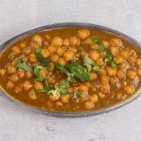 Channa Masala  (VG) · Mildly spiced organic garbanzo beans and caramelized onions, cooked Lahori style. We cannot ...