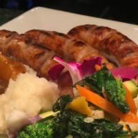 Bangers & Mash · 3 Irish sausages served with garlic mashed potatoes and Guiness gravy mixed vegetables and a...