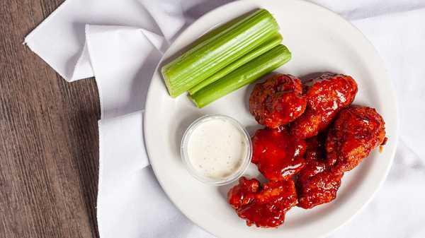 Boneless Wings (6 Pieces) · Enjoy our Seasoned Boneless Wings tossed in your choice of sauce, or none at all, and served with your choice of dipping sauce.