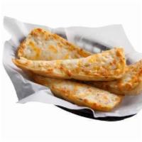 Garlic Bread with Cheese · Our ciabatta bread baked with herbs, our own garlic spread and topped with mozzarella, provo...