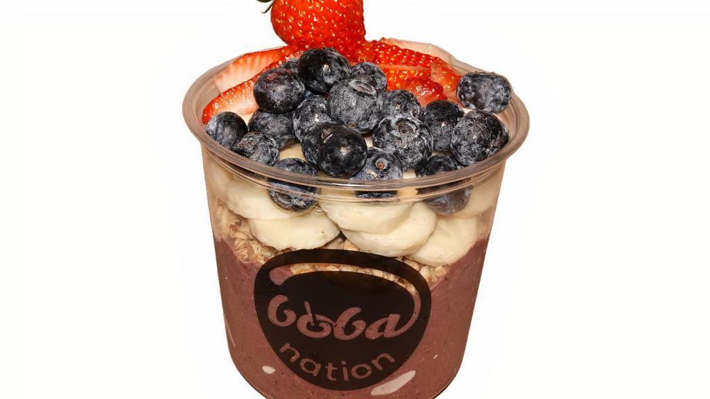 Berry Acai Bowl · Base Blend: Açaí, Banana, Strawberry, Blueberry, Coconut Flakes, Soy Milk, Honey.  Toppings: Granola, Banana, Strawberries, Blueberries