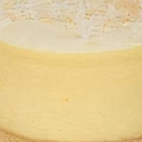 Coconut Cheesecake · Creamy cheesecake topped with coconut