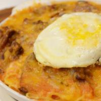 Baked Beef Topped with Egg · 