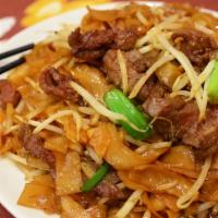 Dry Style Beef Chow Fun · Stir fried vegetables and noodles.