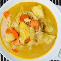 Yellow Curry · With a choice of chicken, pork, beef or tofu in yellow curry sauce with coconut milk, onions...