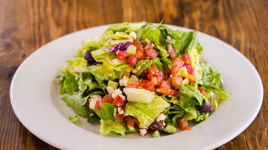 Greek Salad · Chopped romaine, cucumber, tomato, kalamata olives, bell pepper, and imported sheep’s feta cheese (gf)