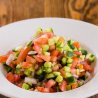 Large Israeli Salad · Chopped cucumber, tomato, red onion, and parsley, served with lemon vinaigrette (gf, v)