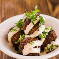 Green Herb Falafel · Five falafel balls topped with tahini and parsley (gf, v)