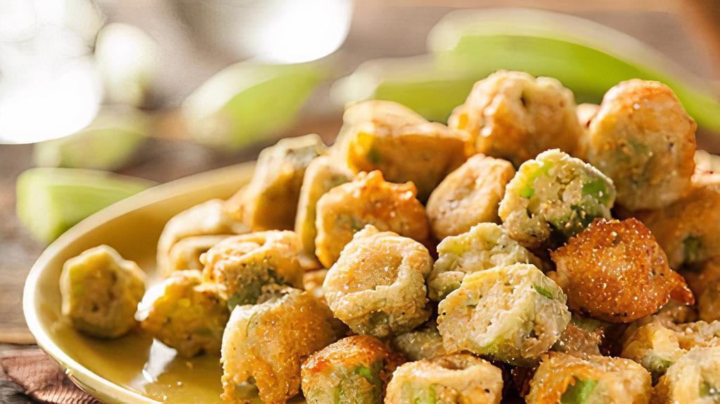 Fried Zucchini & Okra · If you think you don't like zucchini and okra it's because you've never tried this!. Perfectly crispy and seasoned! This veggie treat will have you licking your fingers and begging for more! Served with remoulade sauce.