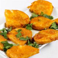 Vegetable Pakora · Mixed vegetable fritters delicately spiced.