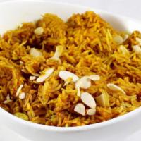 Vegetable Biryani · Mixed vegetables and rice cooked with herbs and spices.