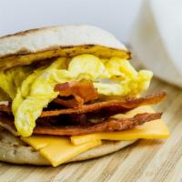 Bacon Egg Muffin · Toasted English Muffin, scarmbled Egg, Bacon, American Cheese, & Butter!