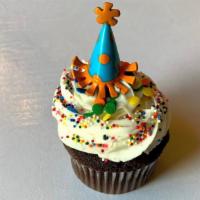 Celebration · All cupcakes are iced with buttercream frosting. Topper include party hats and gift boxes.
