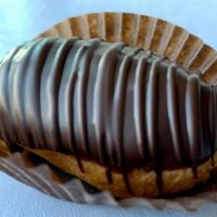 Mini Eclairs · 12 Choux pastry filled with Bavarian cream and topped with a high quality dark chocolate.