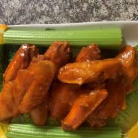 Buffalo Wings · 10 chicken wings hot buffalo sauce, celery, carrots, tartar or ranch sauce