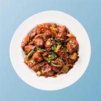 Chicken Manchurian Madness (WET) · Chicken morsels, seasoned, batter fried and sauteed with green onions and an Indo-Chinese Ma...