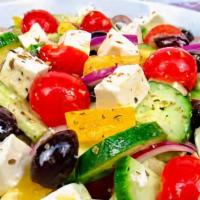 Keto Greek Salad · 6 oz steak on spinach, cucumber, Kalamata olives, roasted bell peppers, feta cheese, cherry ...