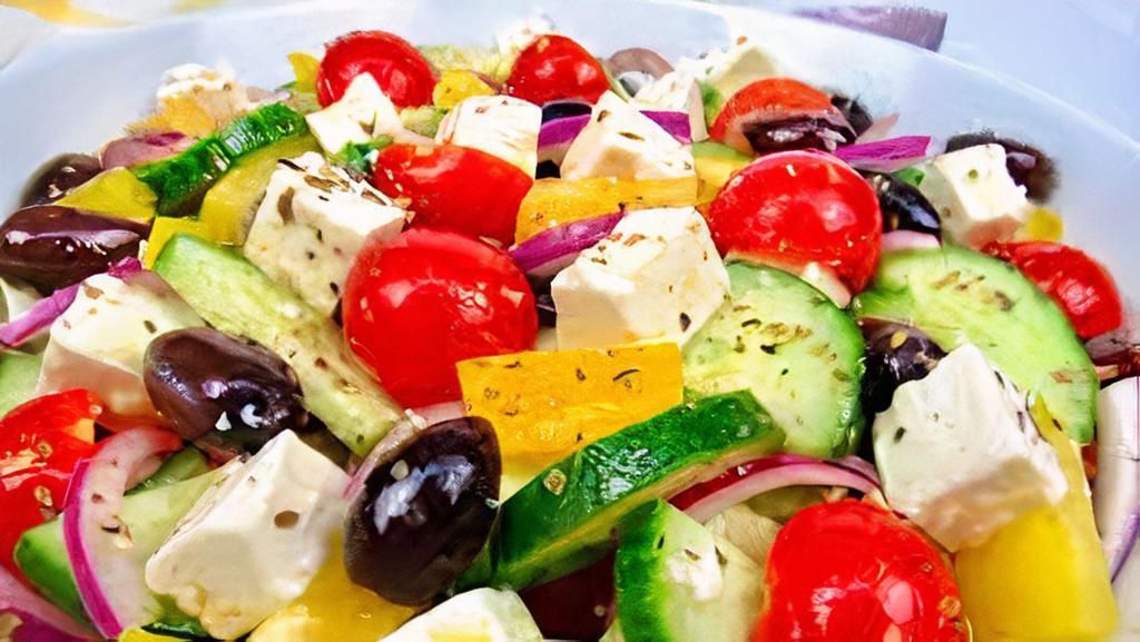 Keto Greek Salad · 6 oz steak on spinach, cucumber, Kalamata olives, roasted bell peppers, feta cheese, cherry tomato with vinaigrette dressing.