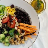 Demeter Salad · Quinoa, corn, beans, garbanzos, sweet potato, green onion, cucumber, tomato, almonds served ...