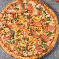Margarita Specialty Pizza · Fresh basil, sliced tomatoes, fresh garlic, Mozzarella cheese.