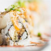 Golden Scallop · Crab meat, unagi & tempura crisps topped with scallops & house sauce