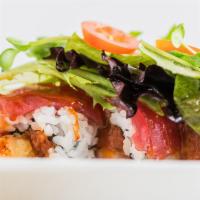 Red Evil · Spicy tuna & tempura shrimp topped with fresh tuna & spring mix with sliced red onion & vine...