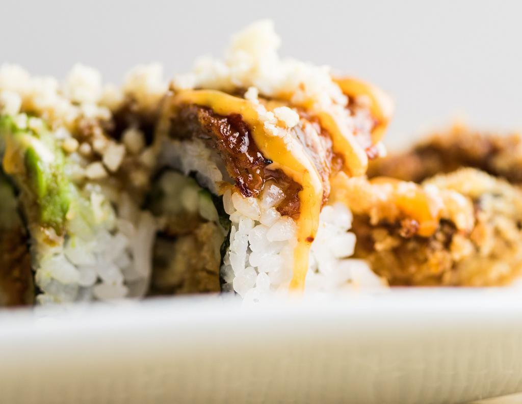 Spider Roll · Soft shell crab with avocado, cucumber & tobiko