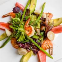 Combination Salad · Asparagus, heart of palm, avocado, tomatoes and grilled prawns served on bed of mixed greens.